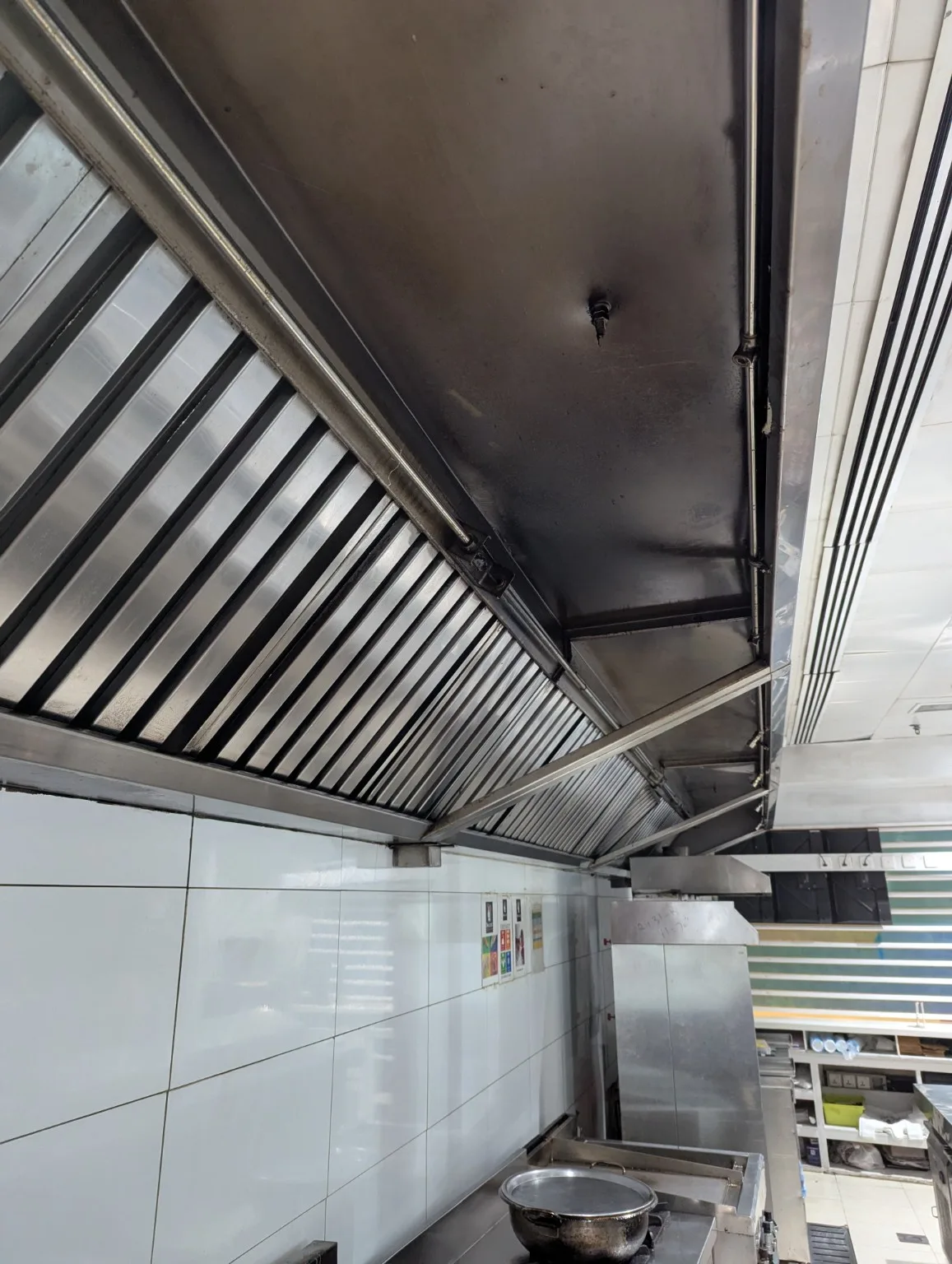 Kitchen hood suppression nozzles and piping