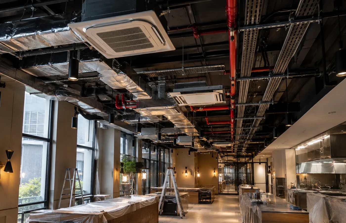 Commercial interior under renovation with building services exposed